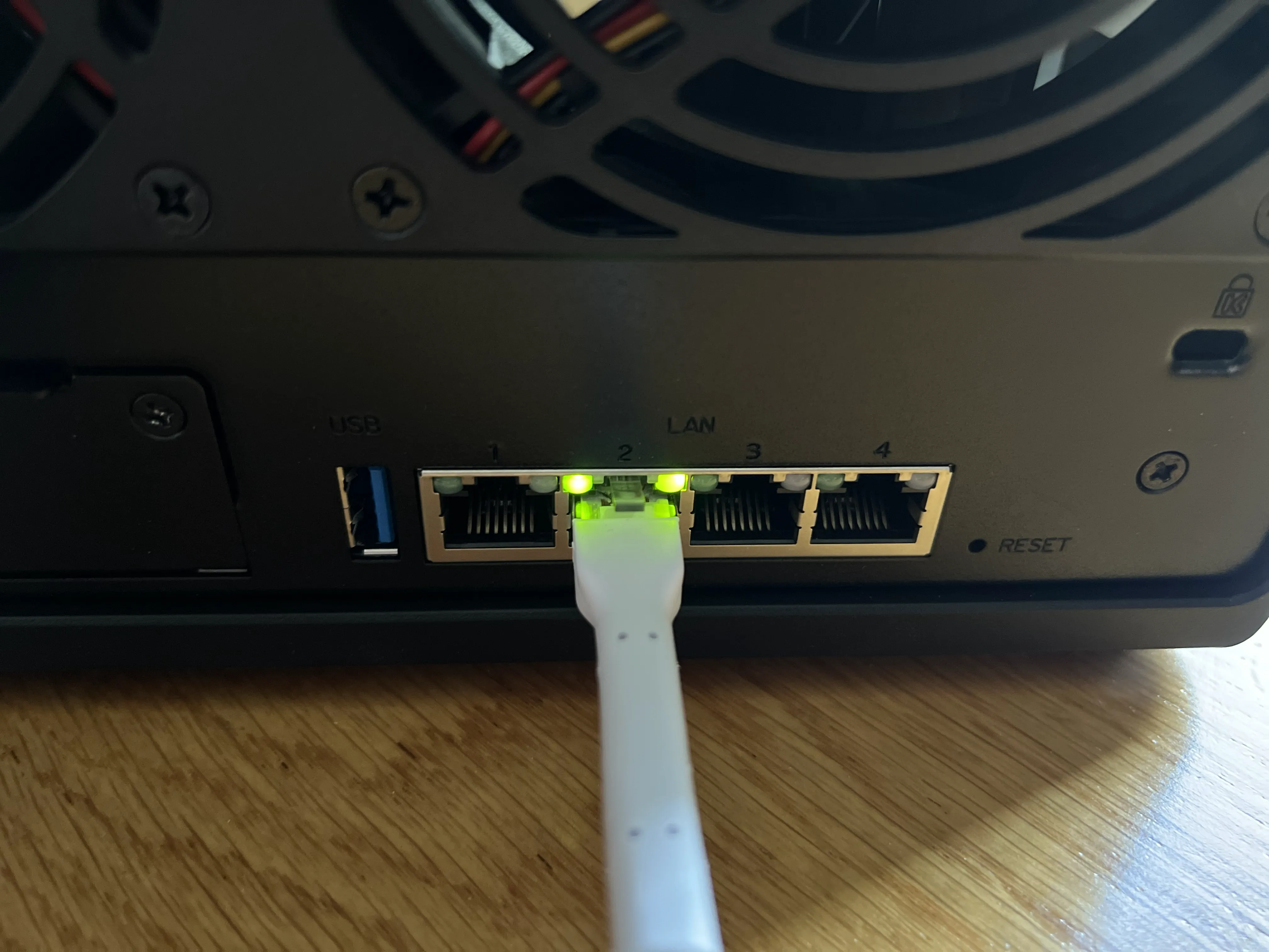 Figure 1. Green LAN LEDs Indicating Network Connection on Synology NAS